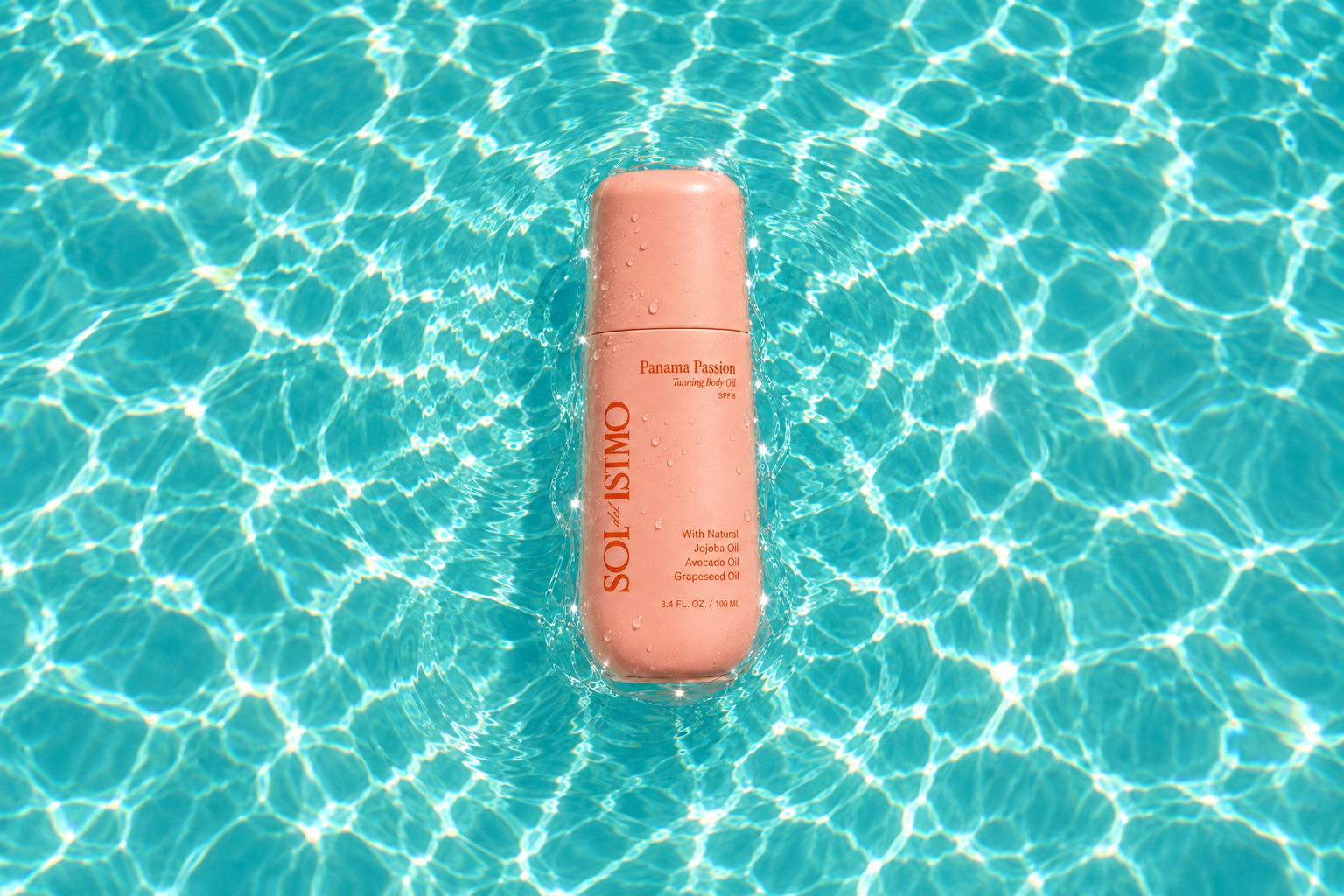 Panama Passion Tanning Body Oil bottle floating flat in a sunlit turquoise pool, seen from directly above